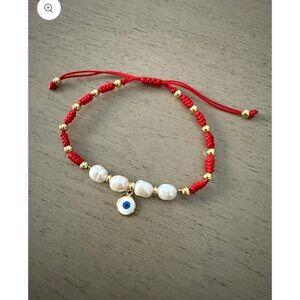 Red and Gold Beaded Bracelet with Evil Eye Charm